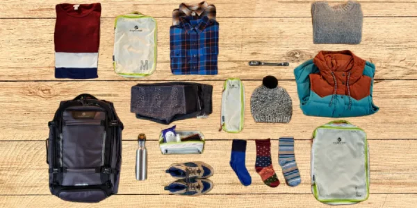 Table with essential items place on it, required for travelling
